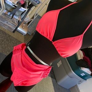 Hot pink swim set. Has light removable padding, small opening for pad inserts.